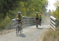 Photo of bicycles crossing bridge