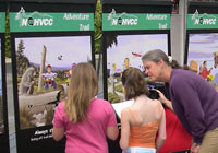 Photo of young people with displays