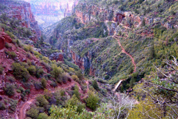 Photo of mounatin range with a trail