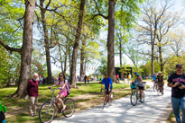 Photo of people biking and hiking on a paced trail